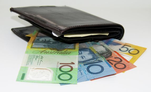 Collection of Australian fifty dollar currency notes in a black male wallet