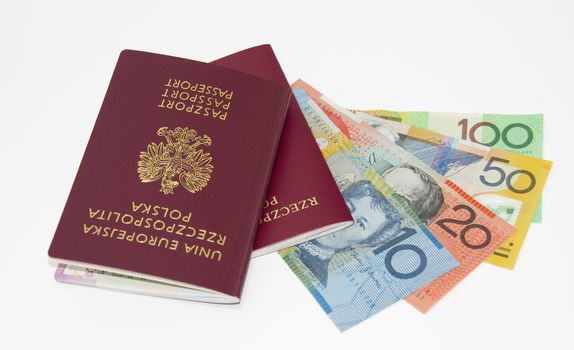 red passport, Australian money, isolated on white.