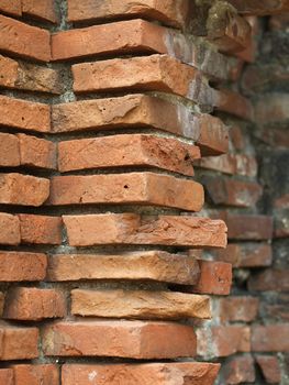 edge of flat piled brick wall