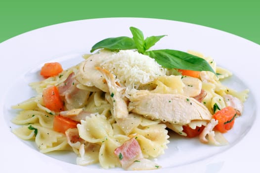 Italian dish: Farfalle with chicken, bacon and cheese on white background