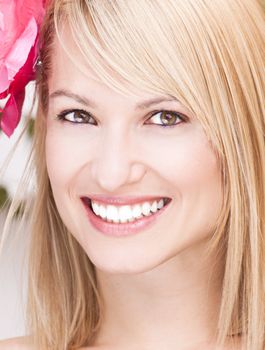 Portrait of a beautiful smiling blonde woman.