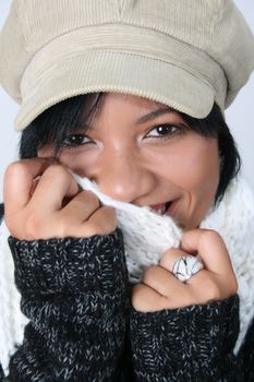 Beautiful young woman dressed in winter clothing