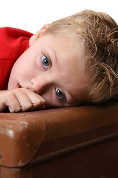 Beautiful blond toddler on a white background