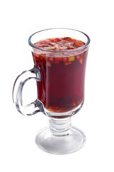 Mulled wine with fruits on white background