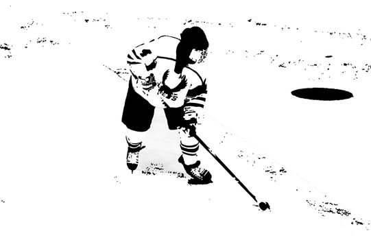 Silhouette of hockey player taking a shot