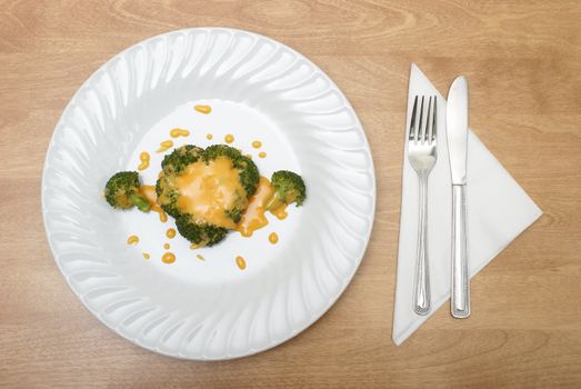 A meal made for someone who is on a diet, consisting of broccoli and cheese.