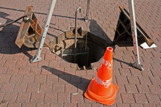 open sewer for the descent. Public Works knew the road