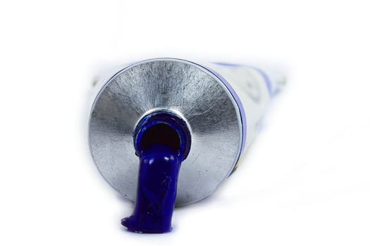 a single  blue paint tube isolated ooaing paintv
