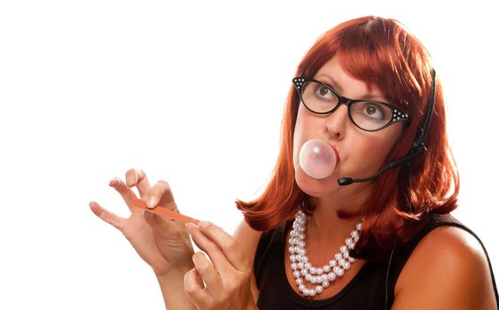 Red Haired Retro Receptionist Blowing a Bubble Isolated on a White Background.