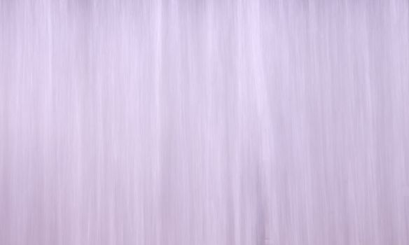 Wall of Water in urban park with slow shutter speed creating soft focus white strand background