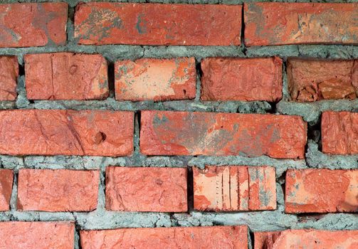 Brick wall of a building destroyed by time