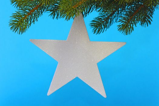 Christmas tree decoration on blue background
