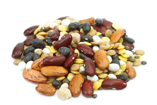 Dried legumes and cereals on a white background