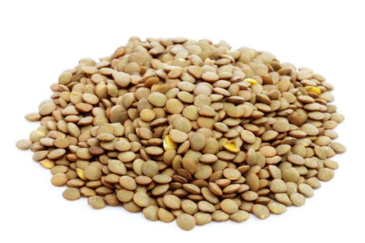 Pile of lentils on bright background