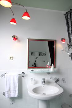 Beautiful modern bathroom with a bowl and a mirror
