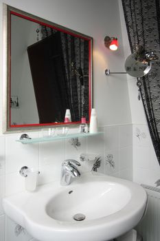 Beautiful modern bathroom with a bowl and a mirror