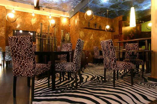 Interior of modern cafe in style of a safari