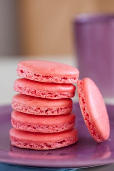 Delicious freshly baked macarons on a plate