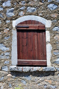 Old window in rural area of Crete, Greece