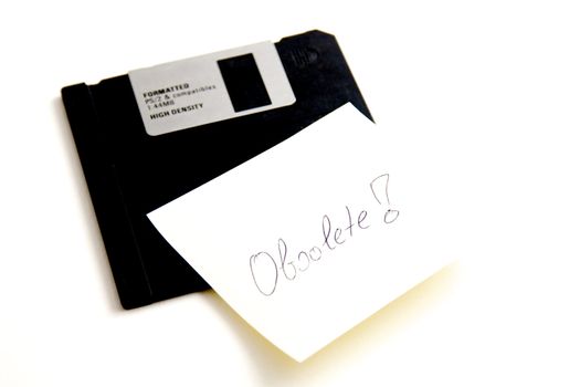 A black floppy disk isolated on white background with note "obsolete!"