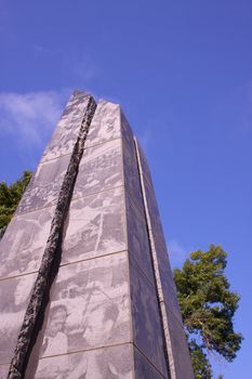 California State Park Veterans Memorial obelisk framed by trees and sky