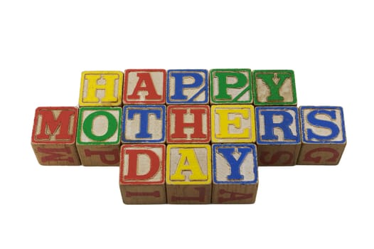 wooden alphabet blocks lined up in a row spelling Happy Mothers Day