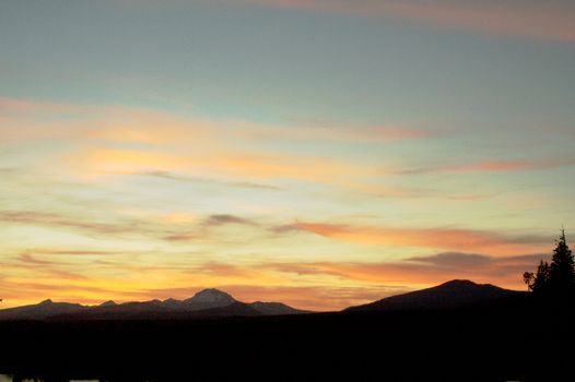 Sunset at Lassen Park with Mountain silhouetted against sky