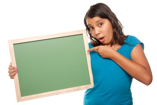 Pretty Hispanic Girl Pointing and Holding Blank Chalkboard Isolated on a White Background.