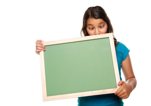 Pretty Crosseyed Hispanic Girl Holding Blank Chalkboard Isolated on a White Background.