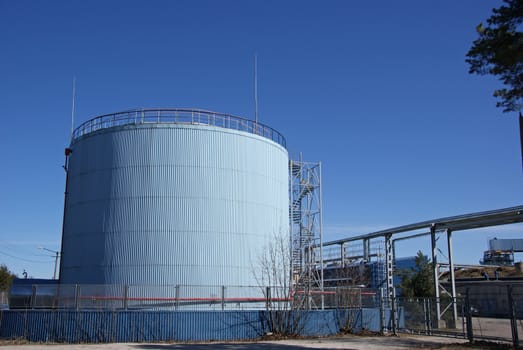 The big fuel tank on a background of the blue sky