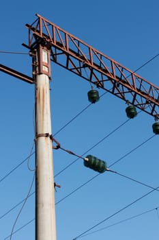 Single electric pillar on a railroad electrical line