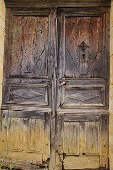 Old doorway to derelict French farmhouse