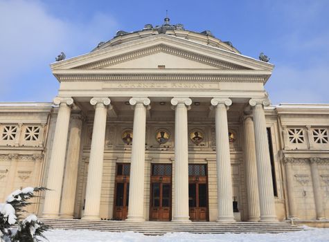 Image during the winter of The Romanian Athenaeum in Bucharest, an important concert hall and a landmark for the city. The building is also home of the George Enescu Philharmonic and the host of the annual George Enescu international music festival.