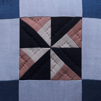 quilted fabric in squares and triangles