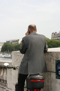 Businessman located near the Seine in Paris France