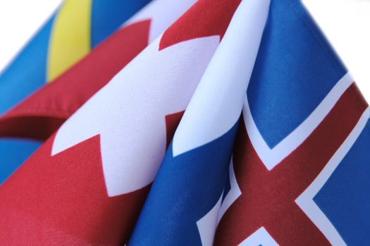 curving flags of Iceland, Finland, Switzerland, Denmark and Sweden