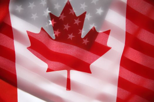 backlit flags of Canada and the USA