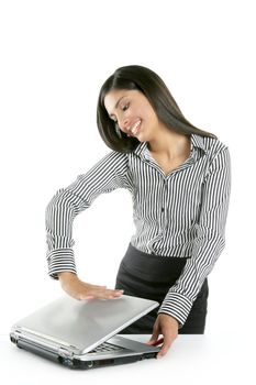 Beautiful brunette woman closing laptop computer