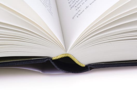 Close up of a book on a white background.