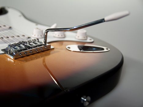 Black and white close up of neck of guitar