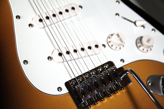 Black and white close up of neck of guitar