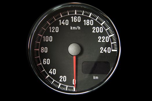 Closeup of a black speedometer of a car