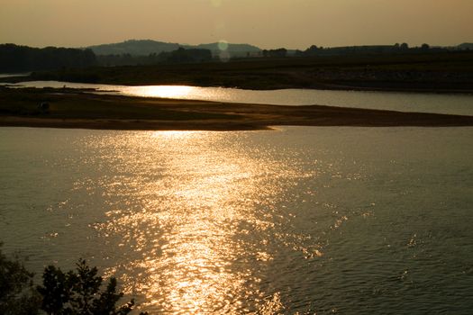 Beautiful sky and horizon reflection on water