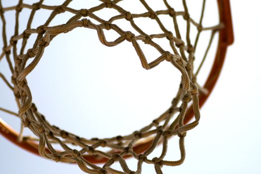 A basket for basketball seen from under