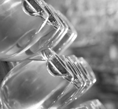 Closeup of bottles of wine aging in an old cellar