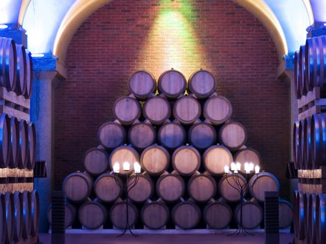 Pile of barrels in a cellar