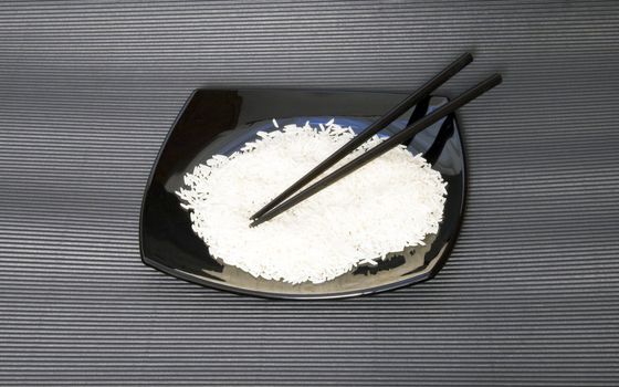 Close up of a plate full of white rice 