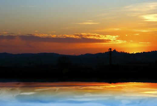 Beautiful sky and horizon reflection on water