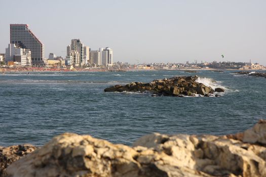 View to the coast line of Tel Aviv from the breakwater