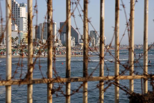 Tel Aviv free city beach behind iron bars
